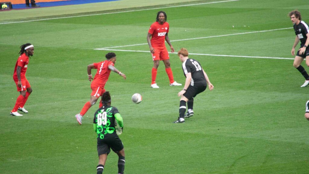 Speed dribbling past The Angry Ginge.