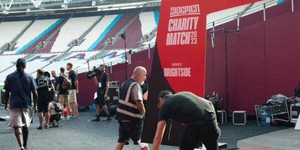Sidemen-Charity-Match-2023-Team-Setting-Up-Award-Facade