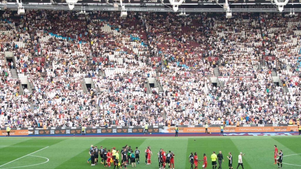 Players coming together after the final whistle.