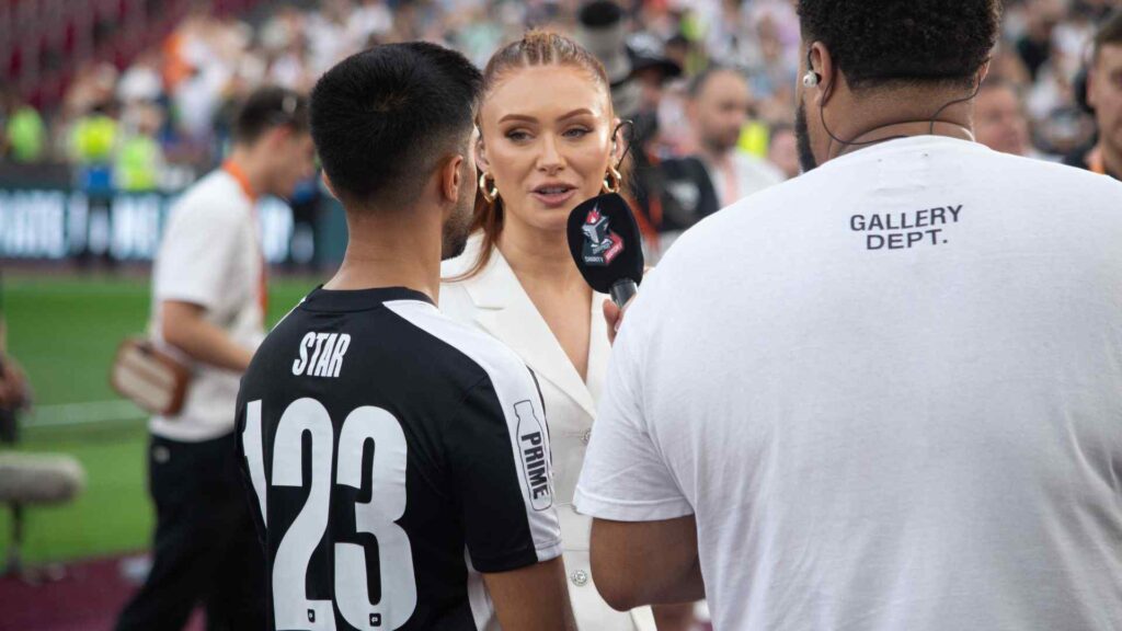 Elz The Witch interviewing Vikkstar at the Sidemen Charity Match 2023.