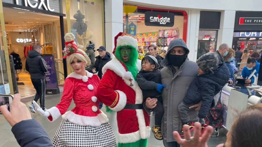 Cindy Lou Who look alike performing with the Grinch at a shopping centre.