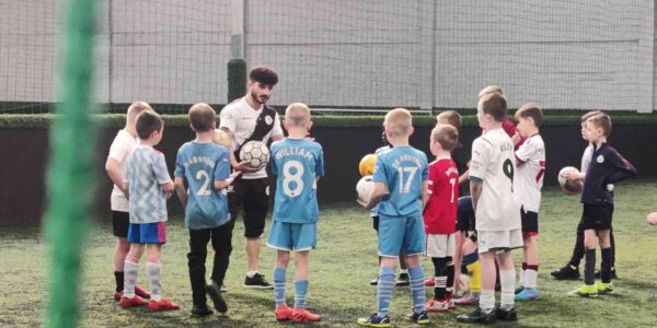 Football-Freestyler-Coaching-Children