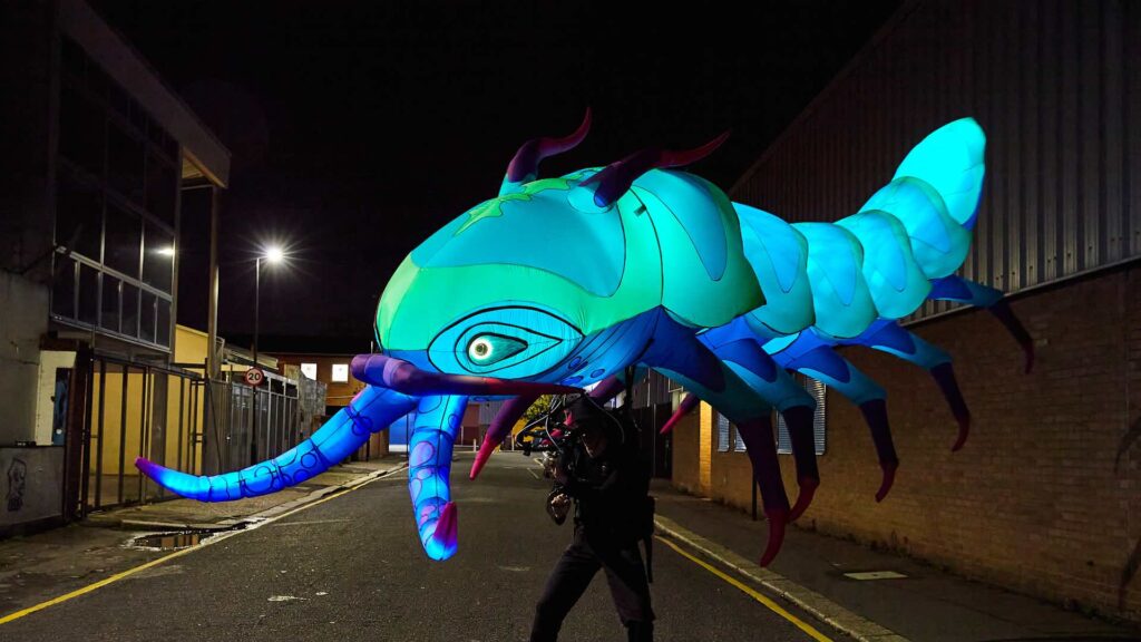 Glowing LED sea creature for events, a mesmerising walkabout feature.