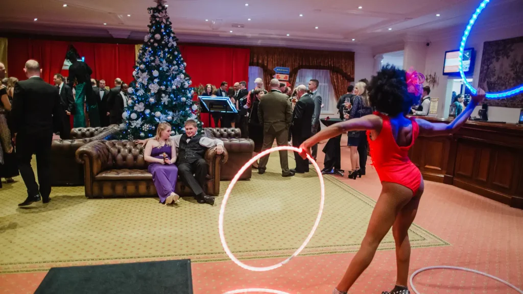 Hoop performer delighting guests at the Renault circus christmas party.