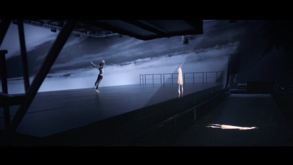 Stage set up of ballerina Boots advert featuring hologram technology and live performer.