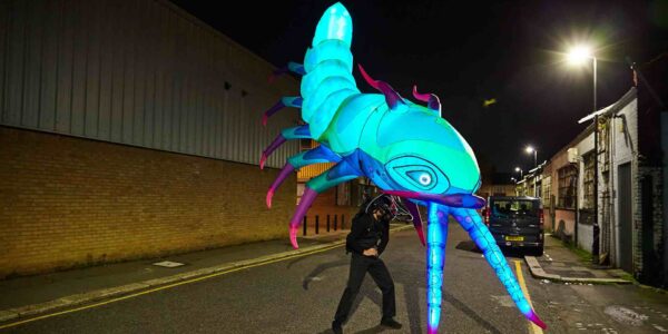 Street-Performer-With-Giant-Inflatable-Sea-Creature