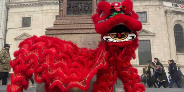 Large-Red-Lion-Dancer-At-Monument