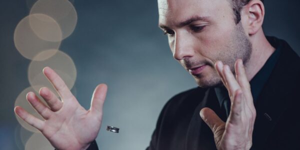 Magician-Starring-At-His-Hands