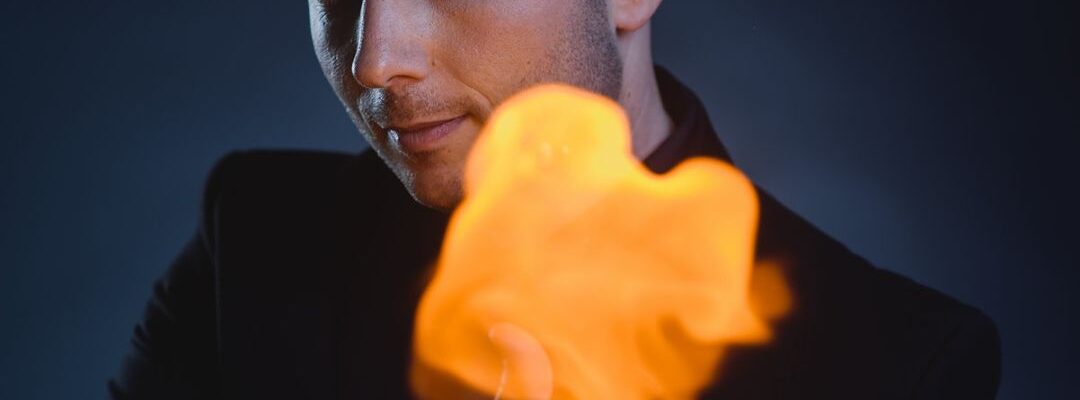 Mentalist-With-Fire-On-His-Hand Mentalist-With-Fire-On-His-Hand