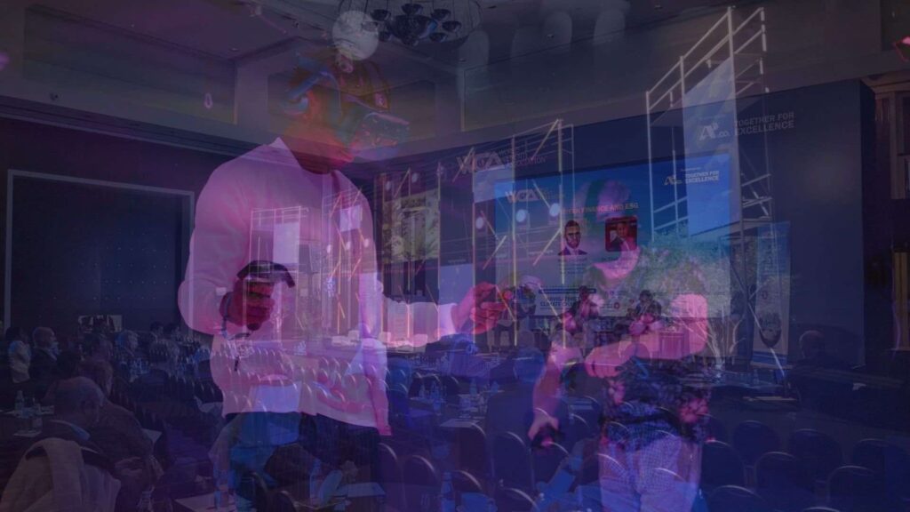 Conference event with people using VR headsets.