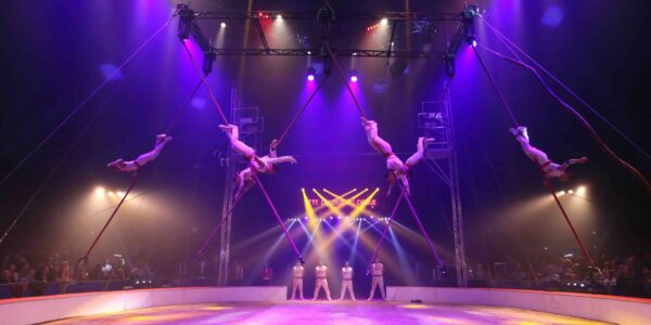 Chinese-Circus-Acrobats-Flying-On-Poles