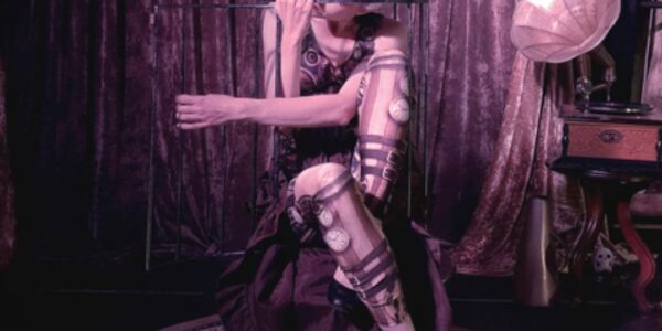 Steampunk-Contortionist-Trapped-In-cage