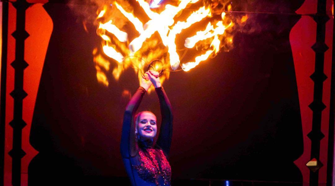 Aerial-Pyrotechnics-Ice-Skater-Holding-Fire