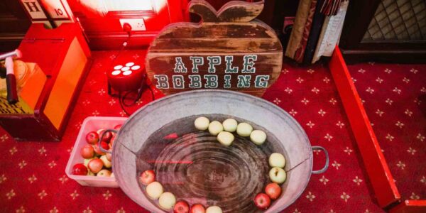 Apple bobbing activity set up at a circus themed party.