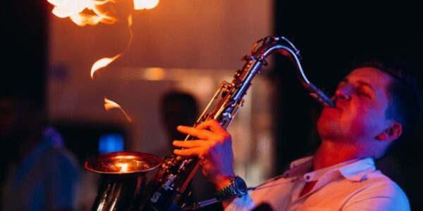 Flaming saxophone performer available for Vegas themed party.