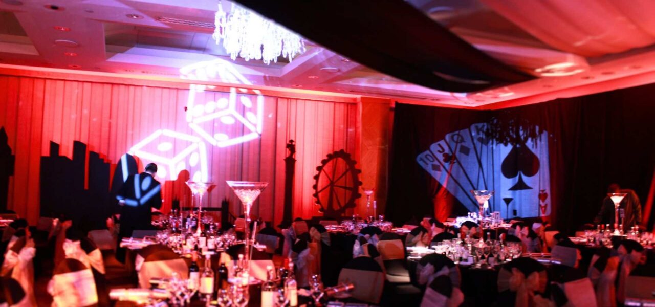 Las Vegas themed gala dinner event venue transformation.