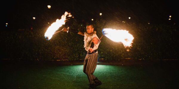 Book flaming fire performers for your circus themed party.