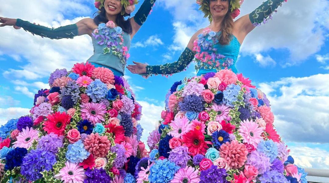 Floral-Stilt-Walkers-At-Corporate-Summer-Party