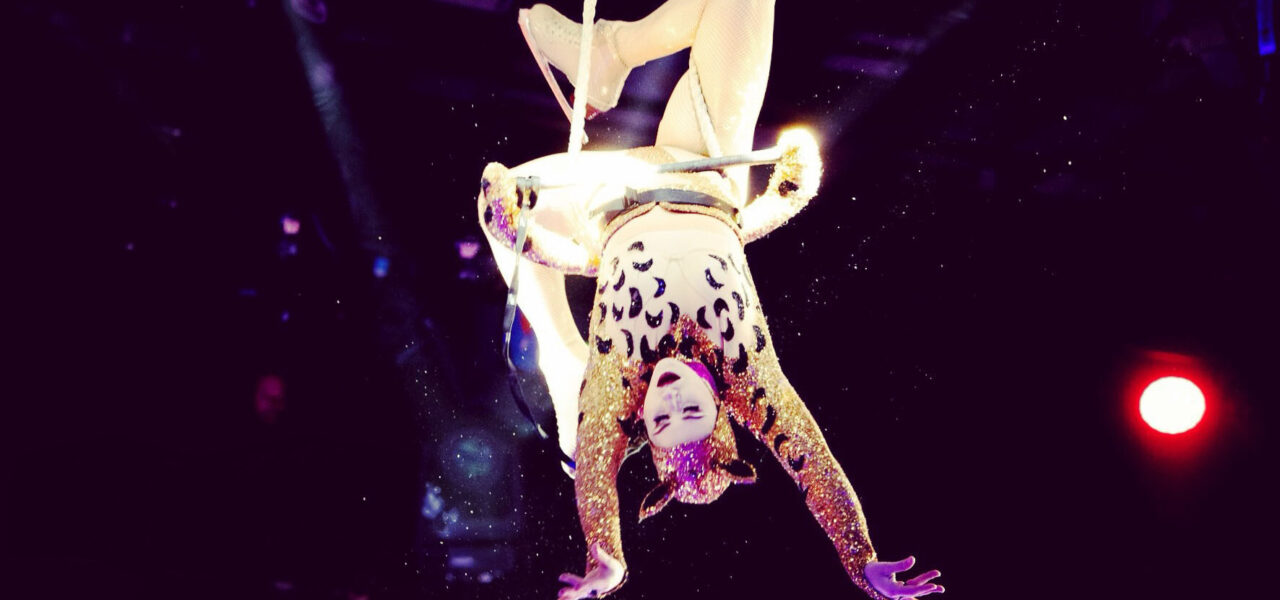 Ice-Skating-Acrobat-In-Cat-Costume