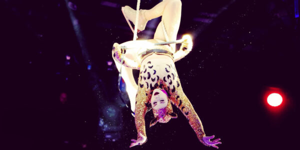 Ice-Skating-Acrobat-In-Cat-Costume