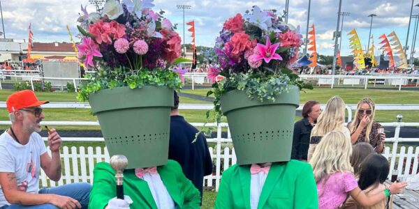 Plant-Pot-Head-Performers-At-Spring-Event