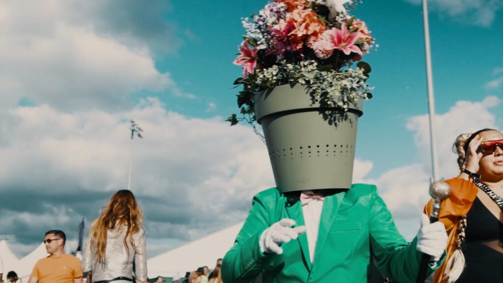 Walkabout floral heads at corporate summer event