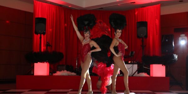 Duo of Las Vegas show girls performing on the dance floor.