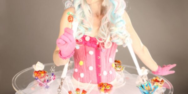 Walkabout-Candy-Table-Holding-lollypop