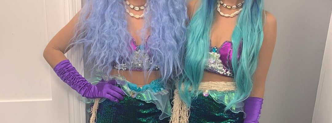 Roaming-Mermaids-With-Hand-On-Hips