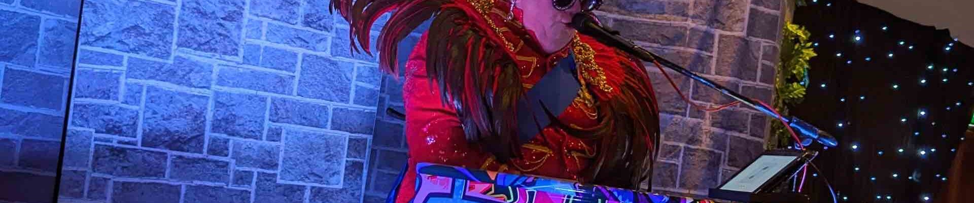 Elton-John-Tribute-Act-With-Graffiti-Piano Elton-John-Tribute-Act-With-Graffiti-Piano
