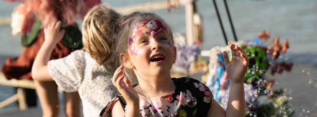 Girl-Playing-With-Bubbles
