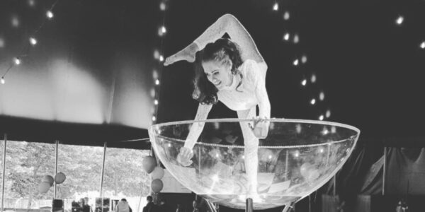 Contortionist-Performing-Inside-Giant-Martini-Glass