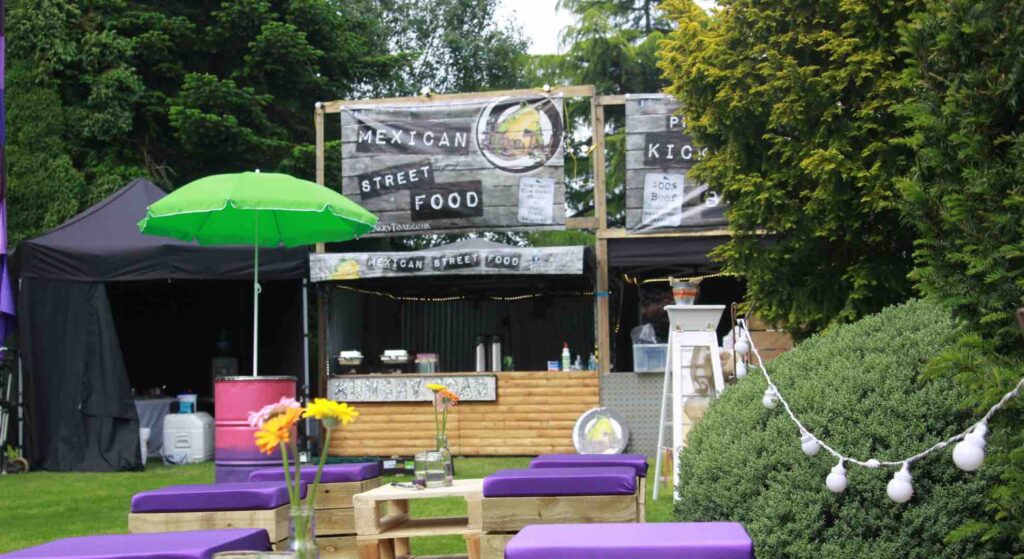 Music themed festival with food trucks, pallet seating and more.