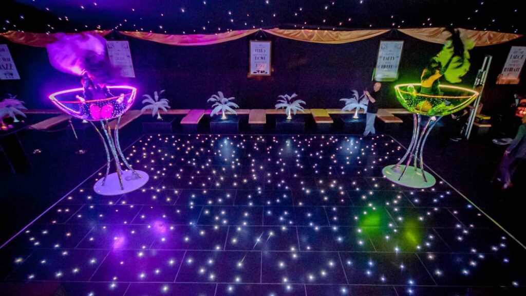 Two LED martini glass acts on sparkly 1920s themed dance floor and event.