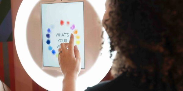 Lady-Selecting-Aura-Booth-Colours