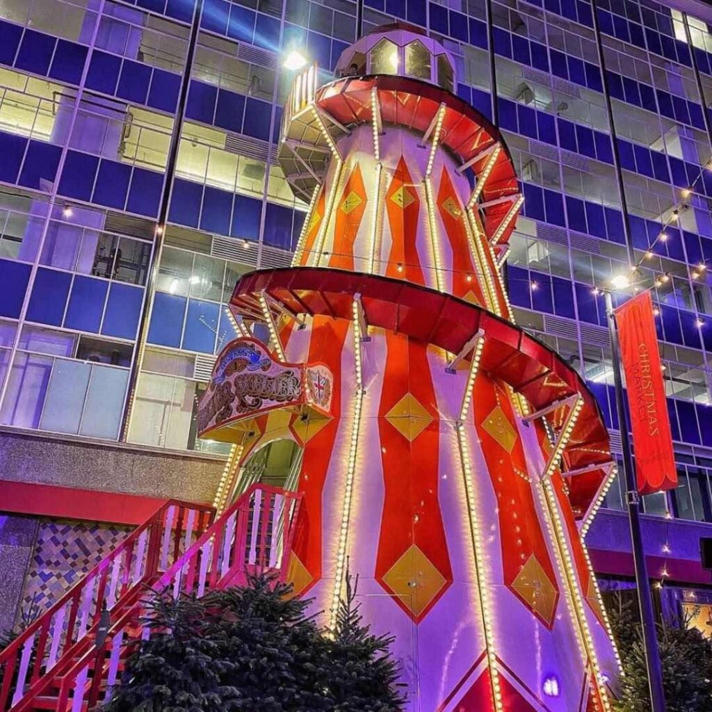 Helter Skelter fairground ride at a community event in the UK.
