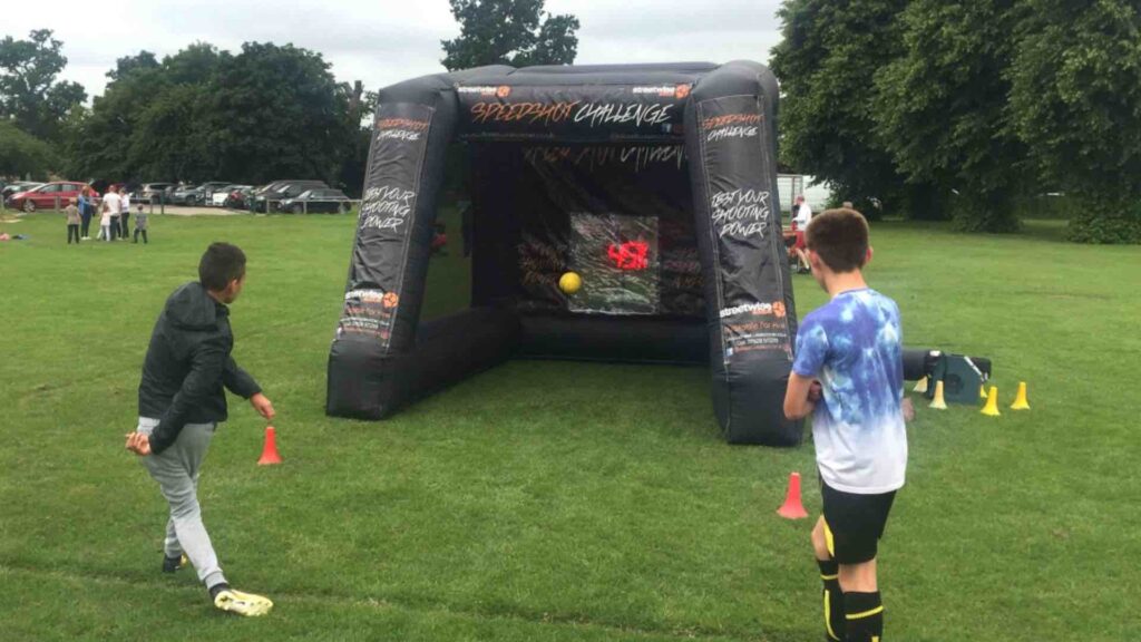 Inflatable football cage ideal for sports events such as corporate fun days.