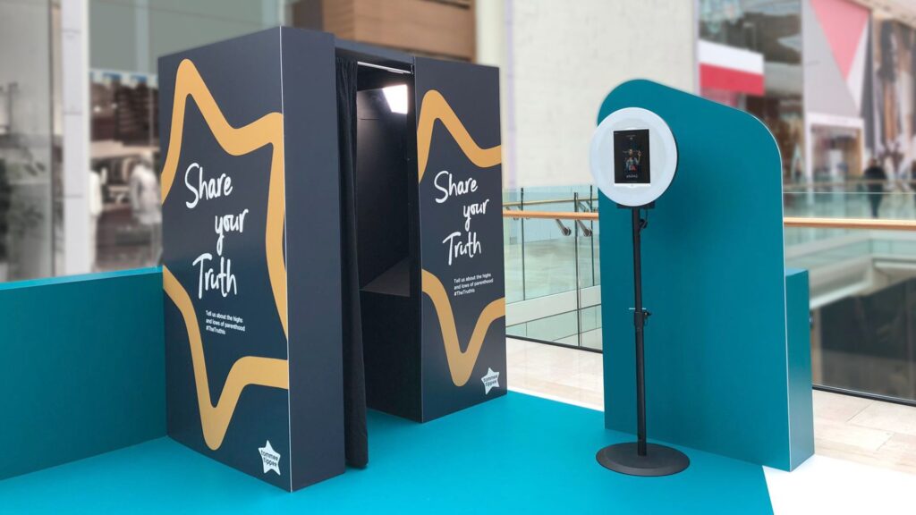 Share your truth message booth perfect for a cool brand activation idea for creative individuals.