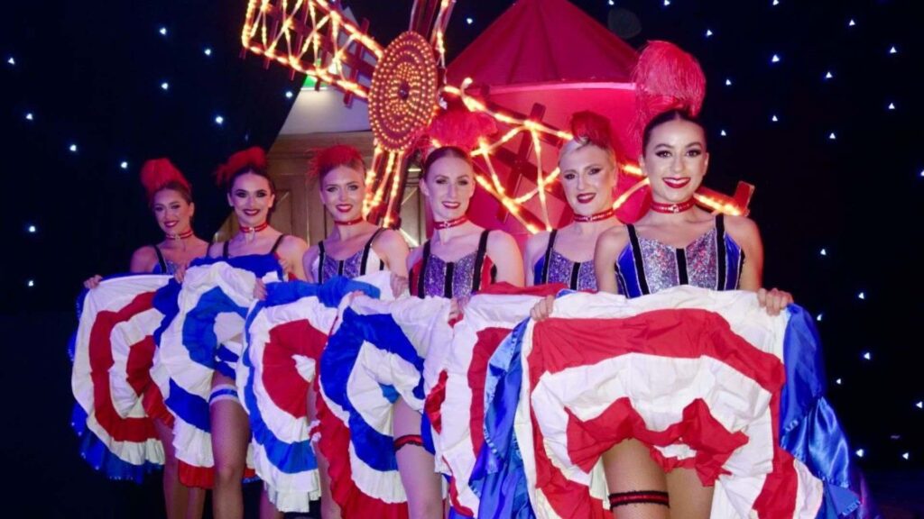 Parisian themed dance group at themed corporate event.