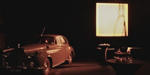 Vintage car and 1920s furniture and props arranged as part of Gatsby event by Julia Charles Event Management.