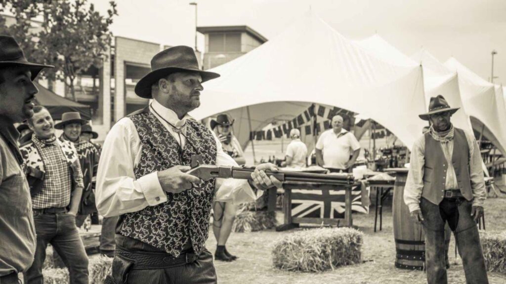 Close-up of wild west stunt show being performed at a family fun day.