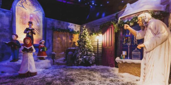 Magical Victorian Christmas Theme grotto with props and scrooge for Christmas events.