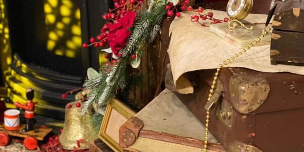 Christmas theming props such as books and mistletoe for office decoration we did for Mastercard.