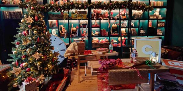 We transformed this space into a classic Christmas toyshop for a set design.