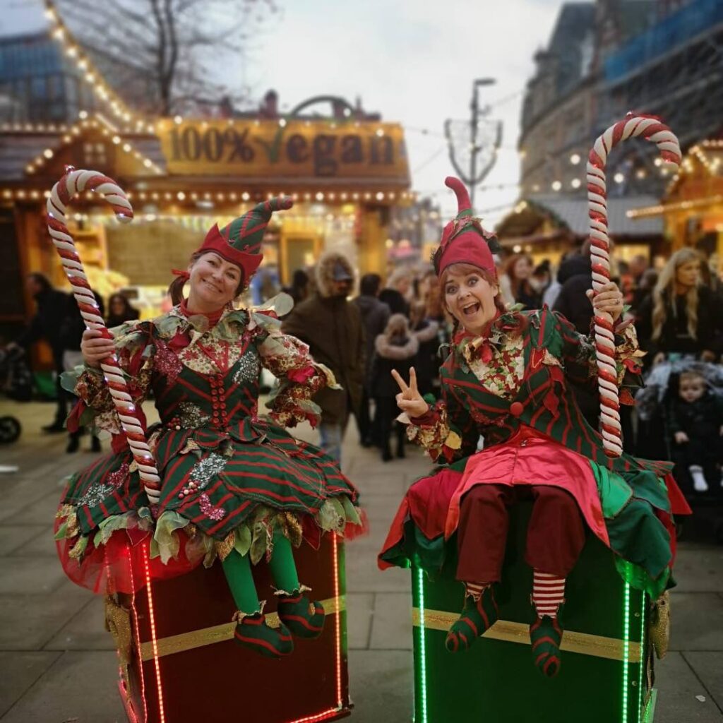 Christmas presents walkabout act at classic Christmas public event. a