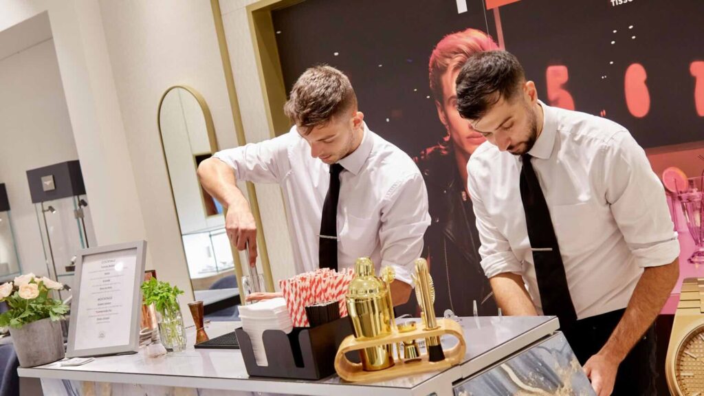 The team at Cocktail Mobile Bar Hire pouring and refining their cocktails and mocktails for guests