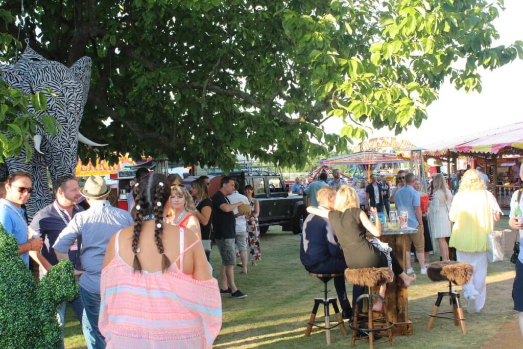 Corporate fun day event space in a public space designed with festival theming.