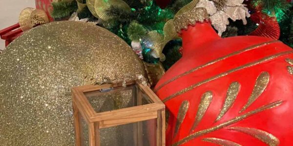 Giant bauble decorations used as part of christmas theming.