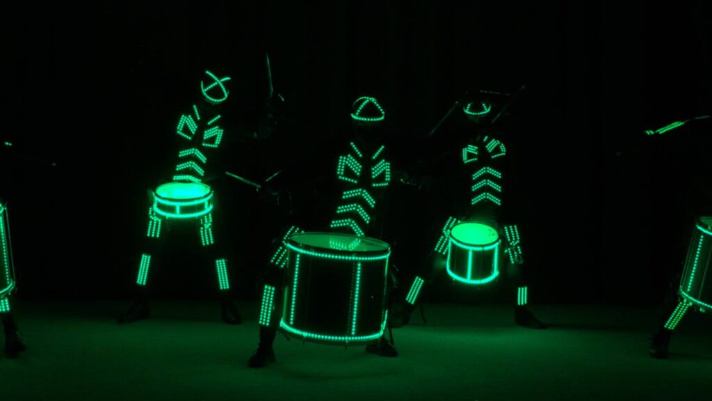 LED drummers performing a show.