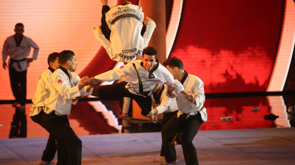 Martial art act performing a stunt.